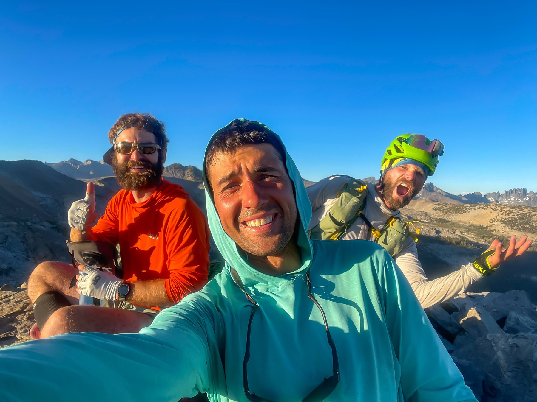 The full 2022 Convoluted Bliss team—Ryan Tetz, Vitaliy Musiyenko and Jason Hardrath—smile for a selfie on a high Sierra ridge