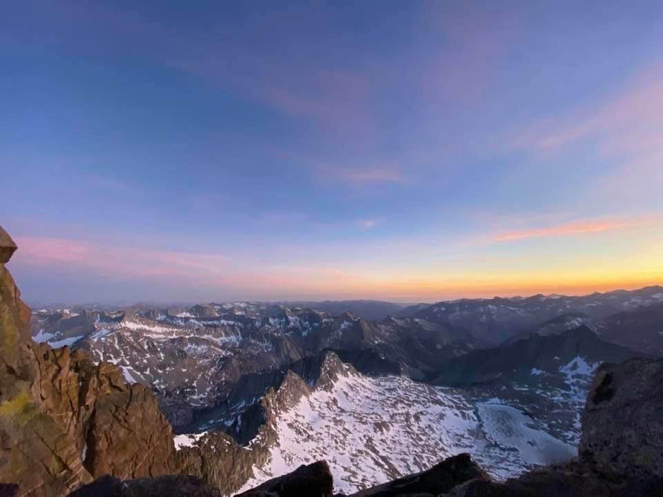 Sunset colors the snowy Palisades during an early Full Monty and pre-Goliath traverse attempt