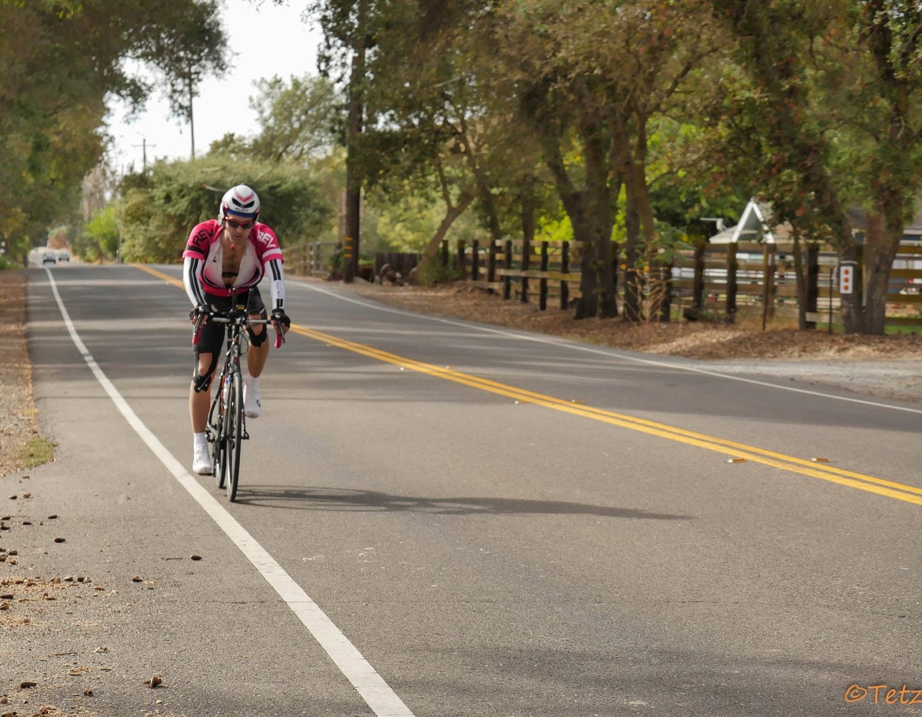 Ryan Tetz rides a road bicycle through the California foothills during Trans-California Crossing Direct